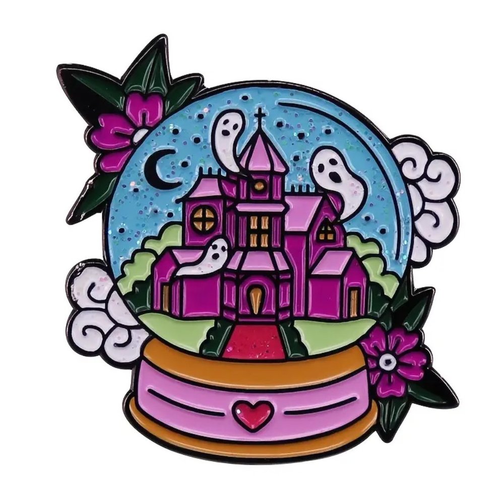 Spooky snow globe haunted house enamel pin
